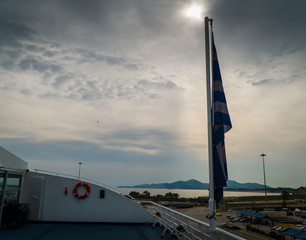 the greek flag symbol of the nation for all the wars that passed towards freedom .is on a...