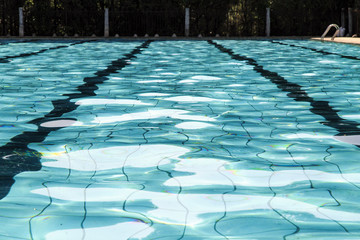 The clear water in the swimming pool