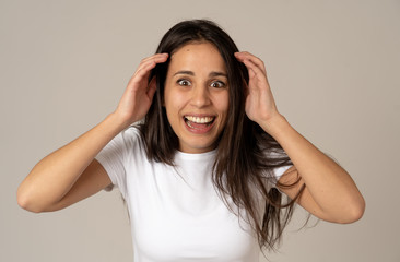 Close up portrait of surprised and happy woman celebrating victory and good news