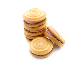 sandwich cookies with strawberry cream on white background