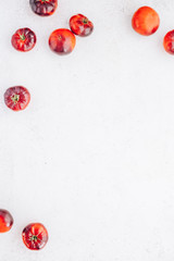 Naklejka na ściany i meble Tomatoes Mar Azul on white wooden table background