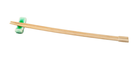 side view of beech chopsticks served on rest