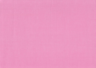 Corrugated colored cardboard pink vintage color. Textural paper cardboard background for design