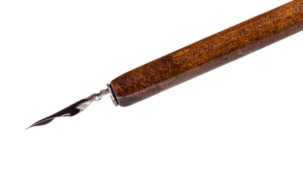 nib filled by black ink in brown dip pen close up