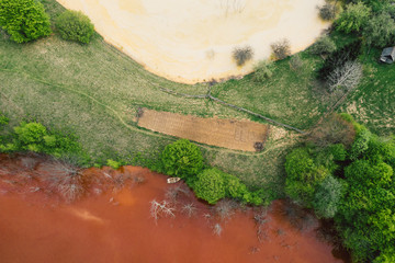 Drone view of contaminated, toxic water stream in Geamana, Romania