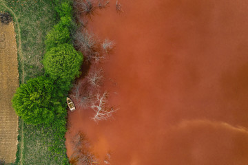 Drone view of contaminated, toxic water stream in Geamana, Romania