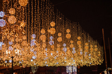 Festive Christmas illumination and decorations on streets