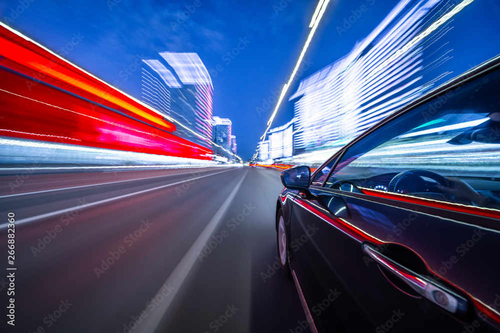 Canvas Prints View from Side of Car moving in a night city