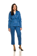 Young business woman standing on white background