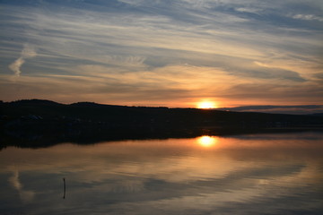 Naklejka premium sunset on the lake