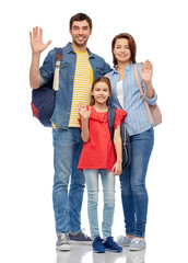 family, tourism and travel concept - happy smiling mother, father and little daughter with backpacks waving hands over white background