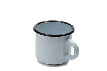 Old iron cup on a white background.Blue mug with black border