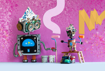 Decorators robots repaints the wall of the room. Funny painters robotic toys, indoors interior redecoration concept. Pink wall background