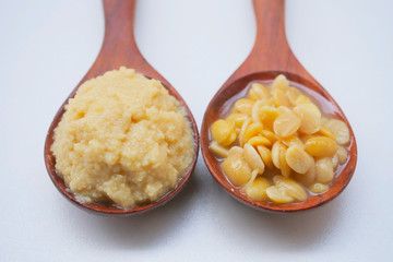 Salted soy beans paste on Wooden spoon