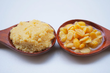 Salted soy beans paste on Wooden spoon