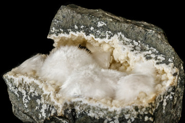Naklejka na ściany i meble Macro stone Stilbite mineral on white black close up