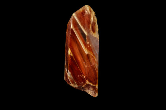 Macro of a mineral quartz stone with lepidokrokit on a black background