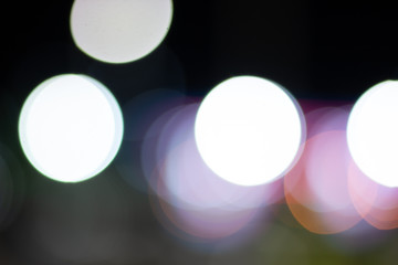 Bokeh on night, abstract background with circles