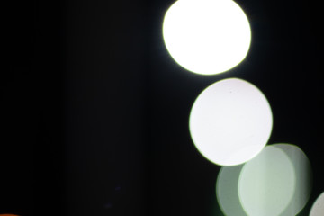 Bokeh on night, abstract background with circles