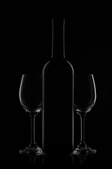 Wine bottle and wineglass