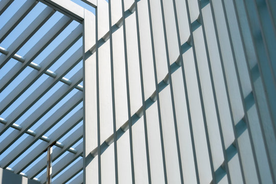 metal grid under blue sky.