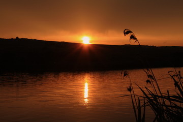 a beautiful sunset on the lake