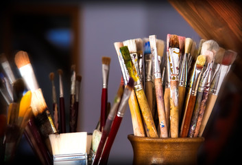 mixed selection of paint brushes of an artist