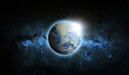 Obraz na płótnie Canvas Planet Earth with sunrise on space background. Elements of this image furnished by NASA.