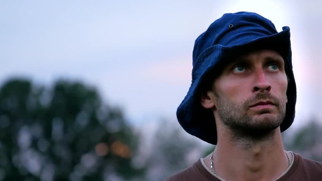 Close-up of cowboy who look for own way for travel