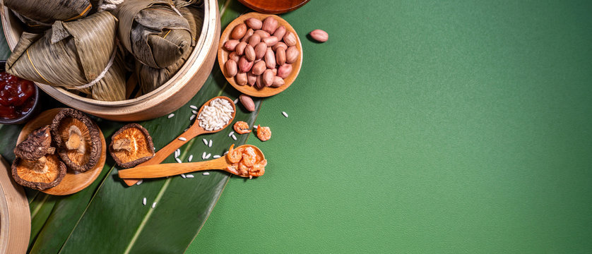 Zongzi, Steamed Rice Dumplings On Green Table Background, Food In Dragon Boat Festival Duanwu Concept, Close Up, Copy Space, Top View, Flat Lay