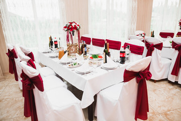 Interior of a restaurant prepared for wedding ceremony