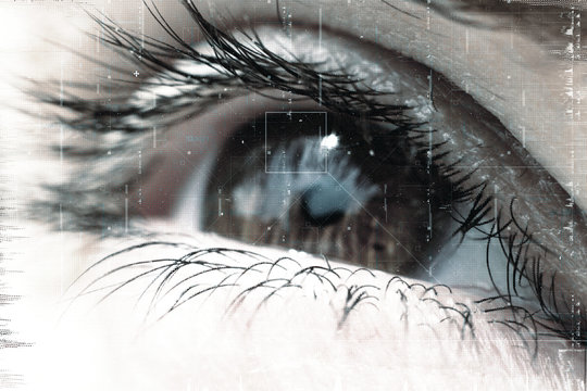 Female Eye With Pupil And Eyelashes Close-up With Overlay Of Technological Futuristic Elements Of Artificial Intelligence.