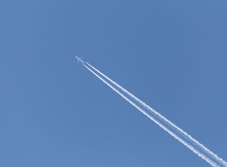 trace from plane in a blue sky