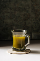 Hot matcha tea in transparent cups