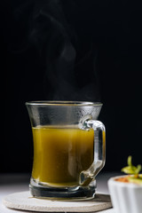 Hot matcha tea in transparent cups