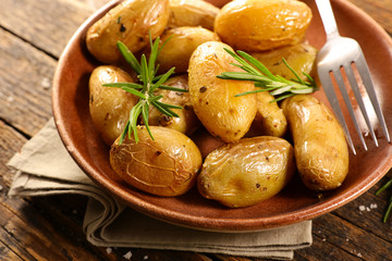 roasted potatoes with rosemary in plate