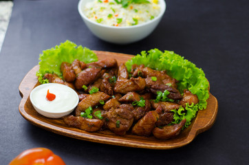portion of pork with rice