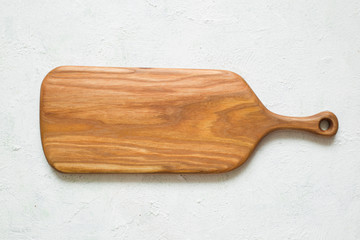 Kitchen cutting wooden  board on a white background.  Top view. 