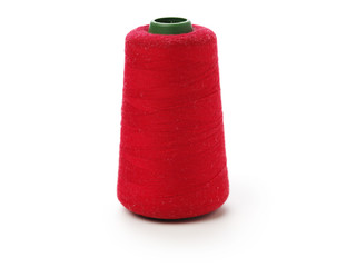 spools of thread for the textile industry on white background