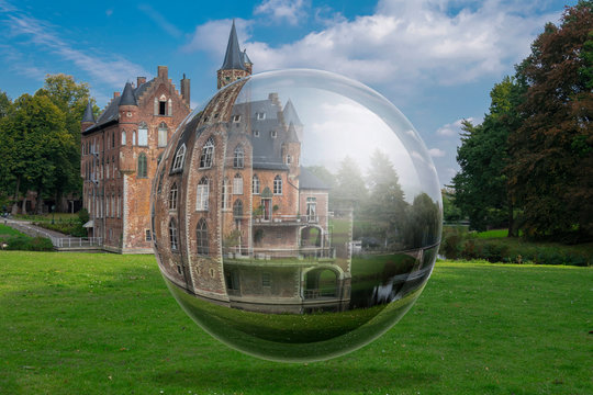 Bazel, Belgium - September 30, 2018, Castle Wissekerke, side view and rear view of the Castle vieuw from a lensball
