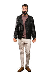 Handsome man with beard with surprise facial expression over isolated white background