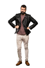 Handsome man with beard angry over isolated white background