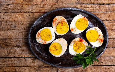 Boiled eggs on a plate top view