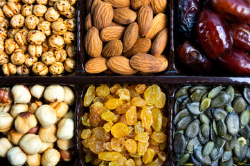 Various nuts and dried fruit arranged serving