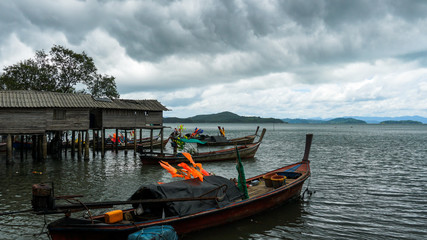 Fototapeta na wymiar Fishing boat in the sea at Moken Village Ranong Province Thailand