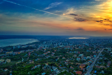 Fototapeta premium Aerial view of Varna city and sea, Bulgaria at sunset