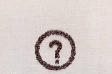 Question symbol in circle from coffee beans on linen texture, aligned bottom center.
