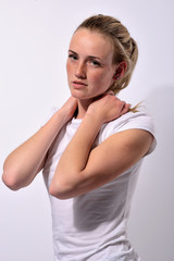 portrait of a young beautiful girl with blue eyes and freckles on a white background