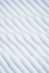 Fluffy Gentle baby white minky fabric with stripes.