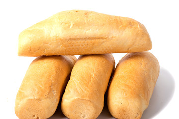 single loaf of fresh baked baguette bread isolated on white background